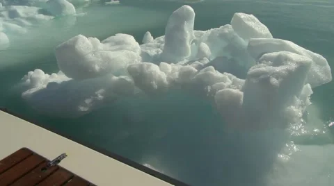 Still of floating Arctic ice next to side of boat Stock Footage 59997793