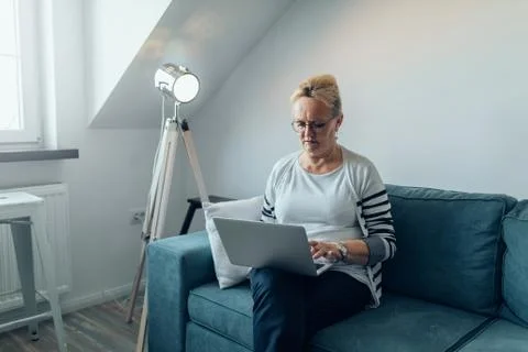 Still getting to grips with this new technology Stock Photos