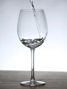 Still of a glass with background light. Stock Photos