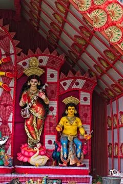Still image of beautiful decorated Devi Saraswati and Lord Kartikeya being .. Stock Photos