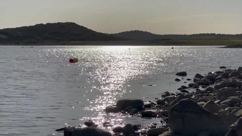 Still Lake with Sunlight Reflection Stock-Footage 154214554