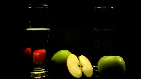 Still life of apples and cider on the black background Stock Footage 107746211