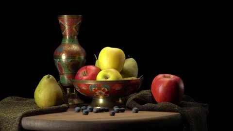 Still life with apples and pears on a black background. Stock Footage 148372156