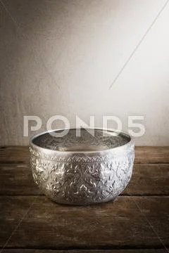 Still life art photography on vintage silver bowl Stock Photos