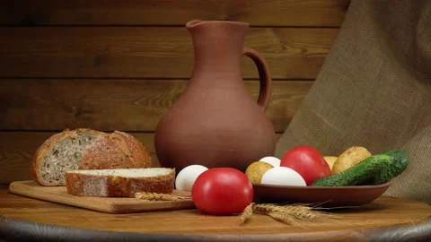 Still life with bread and vegetables. Stock Footage 159053669