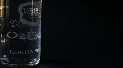 A still life bubbles of a bottle sparkling water in a blue dark background Stock-Footage 56376519