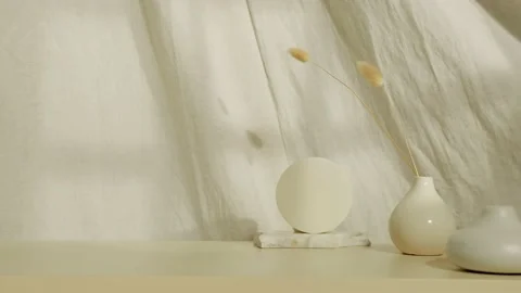 Still life with ceramic products and a flower in a vase, on the background of li Stock Footage 197817545