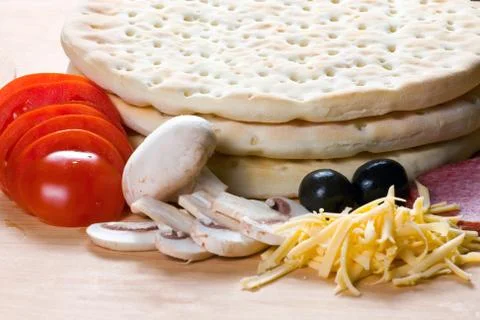 Still-life with components for a pizza Stock Photos