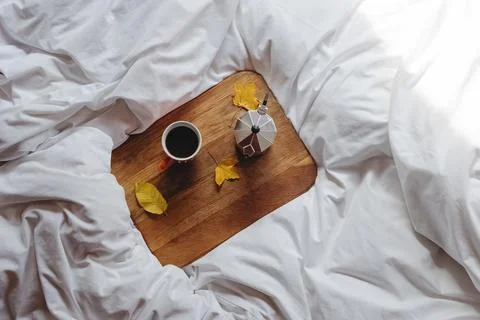 Still life composition with coffee and yellow leaves Stock Photos