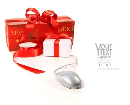 Still life of computer mouse and christmas presents Stock Photos