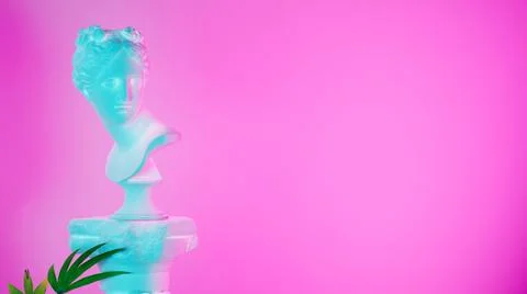 Still life copy space, bust of an antique Venus statue with modern lighting p Stock Photos
