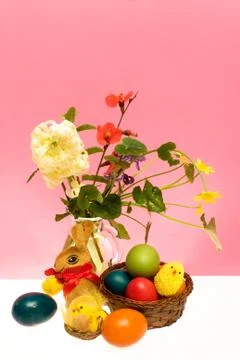 Still life with easter eggs and flowers Stock Photos
