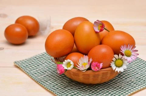 Still life with easter eggs and flowers in rustic style Stock Photos