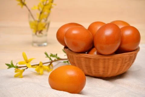Still life with Easter eggs in a basket Stock Photos