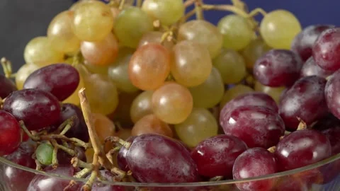 Still life with fruit and a bottle of wine. Apples, pears, plums, grapes and nec Stock Footage 139097612