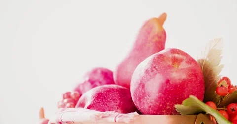 Still life fruit rotation 4k looped copy space video. Red Food basket on white Stock Footage 68458633