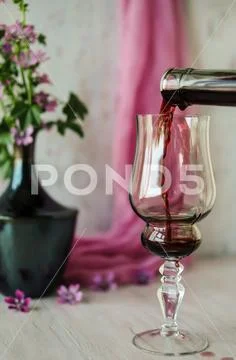 Still life with a glass of wine. Stock Photos