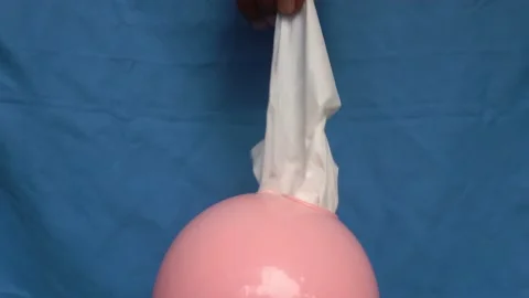 Still life hand pulling out the tissue paper from the box Stock-Footage 232473474