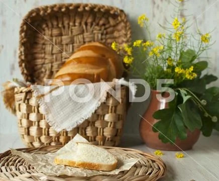 Still life with a loaf of bread. Stock Photos