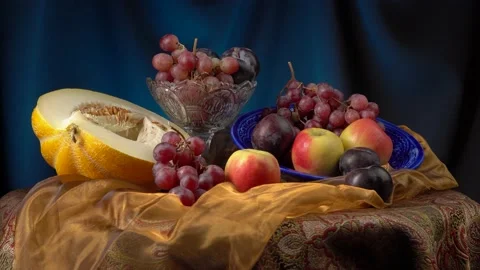 Still life with melon and fruit on a dark blue background. Stock Footage 160405580