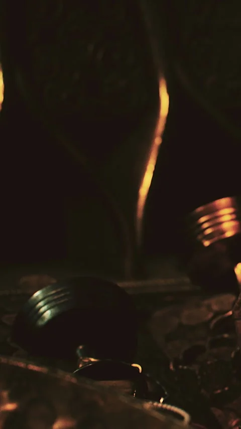Still life of metal objects in dim light on a wooden surface Stock Footage 348105591