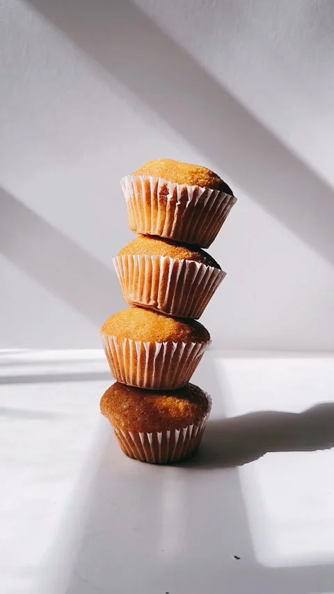 Still Life, Minimalism, stack of muffins falling, window light Stock Footage 267166757
