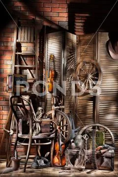 Still Life With Old Spinning Wheel, Violins And Ladder Stock Photos