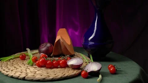 Still life with pumpkin, cherry tomatoes, red onions and green onions Stock-Footage 146889875