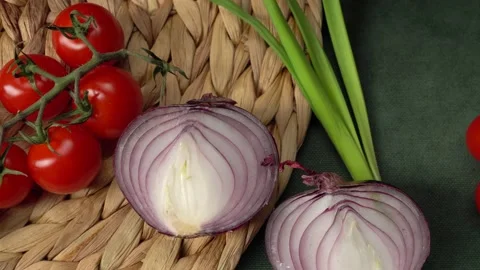 Still life with pumpkin, cherry tomatoes, red onions and green onions Stock Footage 147042164