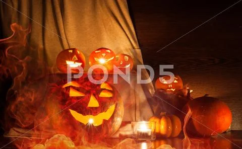 Still life of pumpkins to celebrate halloween with funny faces Stock Photos