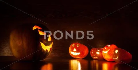 Still life of pumpkins to celebrate halloween with funny faces Stock Photos