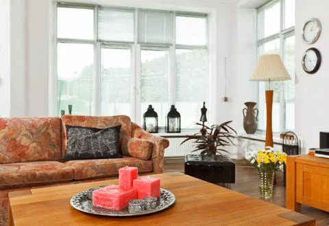 Still life with red rectangular candles on silver tray Foto stock