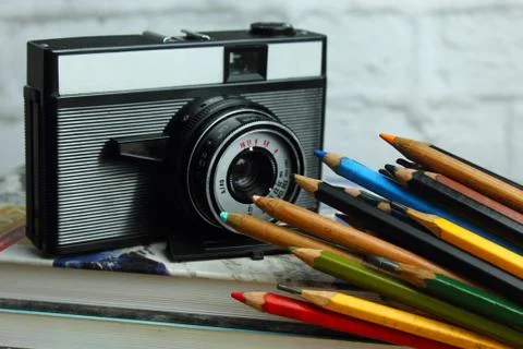 Still life with retro camera Stock Photos