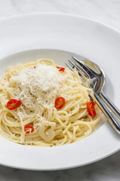 Still life of spaghetti aglio e olio Stock Photos