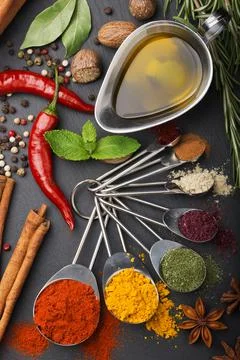 Still life with spices and olive oil Stock Photos