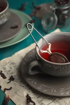 Still life of two cups of tea in a dim evening light. Stock Photos