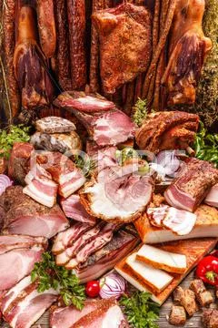Still life of various smoked pork meat Stock Photos