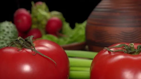 Still life with vegetables on a black background. Stock Footage 146582029