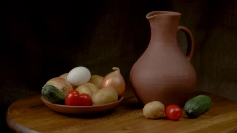 Still life with vegetables on a black background. Stock Footage 159469989