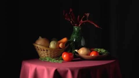 Still life with vegetables on a green background. Видео 148321641