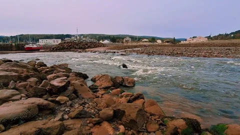 Still Low Level Shot Of Light Rapids From Water Running Into Atlantic Ocean Stock-Footage 255335715