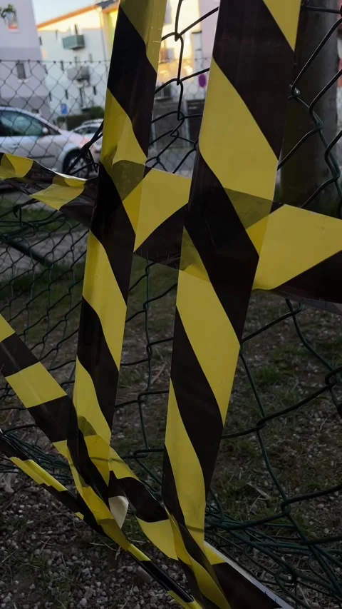 Still observation of twisted tape with blurry building setting at evening Stock Footage 341672598