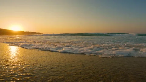 Still recording of Sunset and waves at a beach in Ikaria island of Greece Stock Footage 238011901