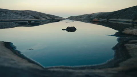 Still Reflection in Coastal Rock Pool at Dusk Stock Footage 341071464