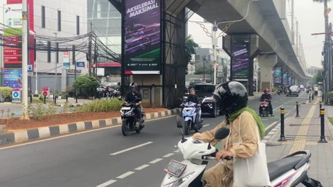 Still shot of a day condition normal traffic at south jakarta Stock Footage 256095229