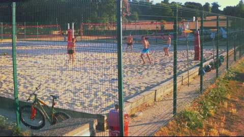 Still Shot of Friends Playing Volley Ball Stockbeeldmateriaal 234341853