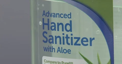 Still Shot of the front of a container of Hand Sanitizer Stock Footage 127133137
