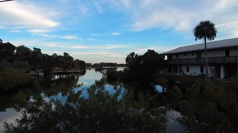 Still shot of house sitting next to water Video stock 45289872