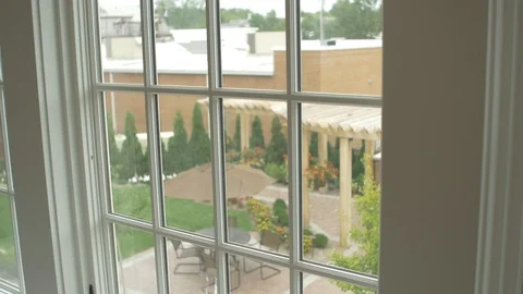 Still Shot of Interior Window Overlooking Patio Stock Footage 100899672