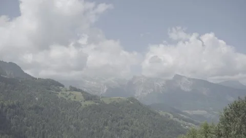 Still shot of landscape with mountain, cloudy sky in summer, 4K, Log Stock Footage 241029156